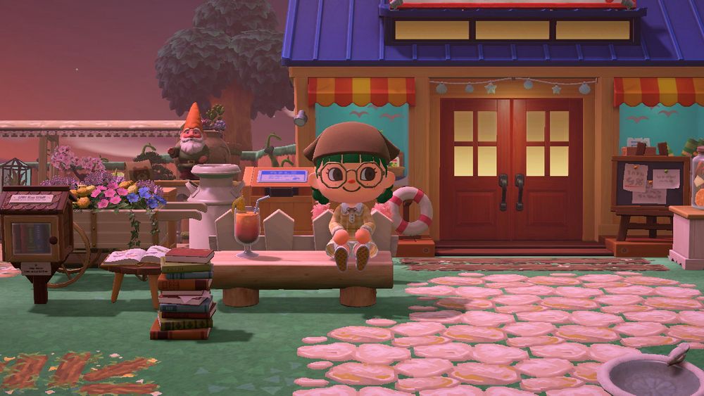 lohla’s animal crossing character sitting in front of nooks cranny