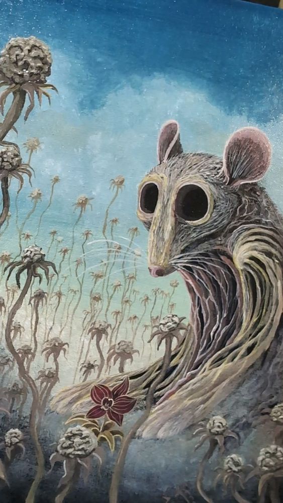 A closer look at the rat and the orchid.