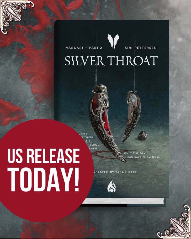 Silver Throat cover (fang-shaped blood vials encased in elaborate, antique silver filigree) on a smokey backdrop.