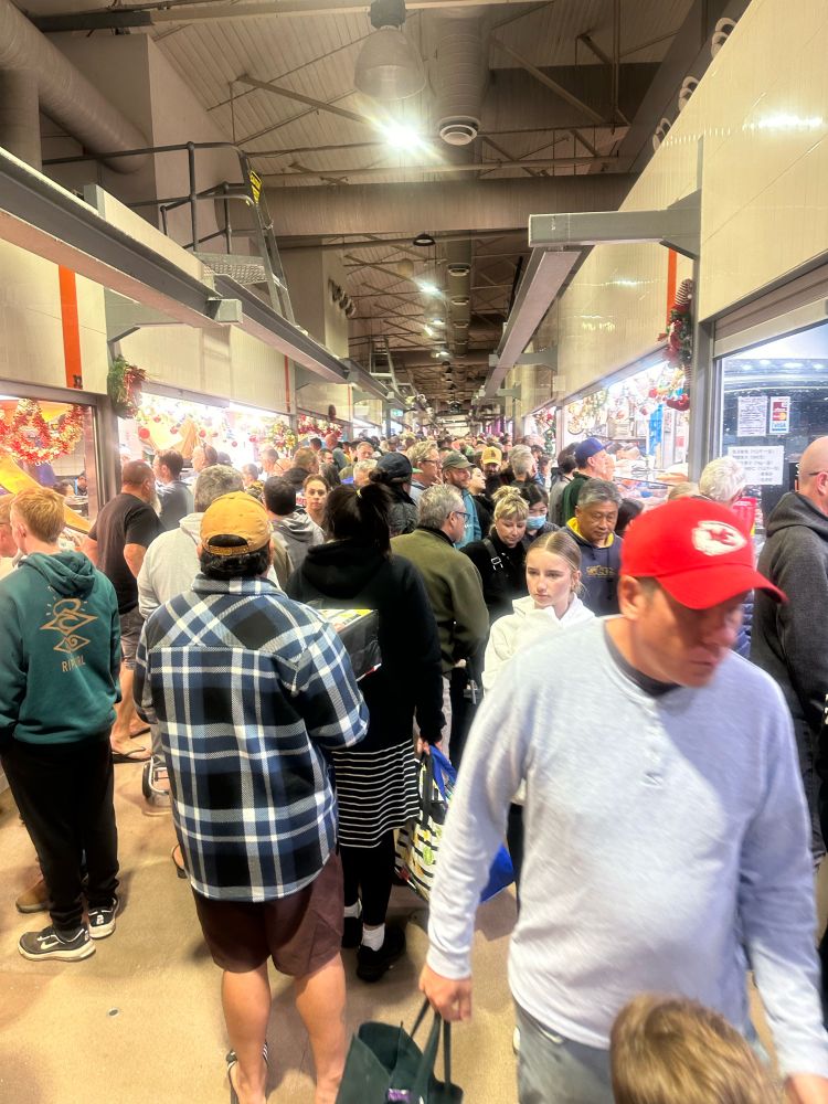 Photo of crowds at the Queen Victoria Market in Melbourne. 