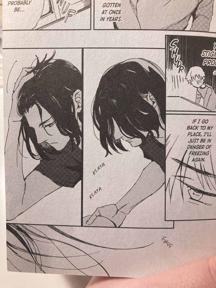 Panels in which the metal head character brushes his hair out of the way of his face with his hand.