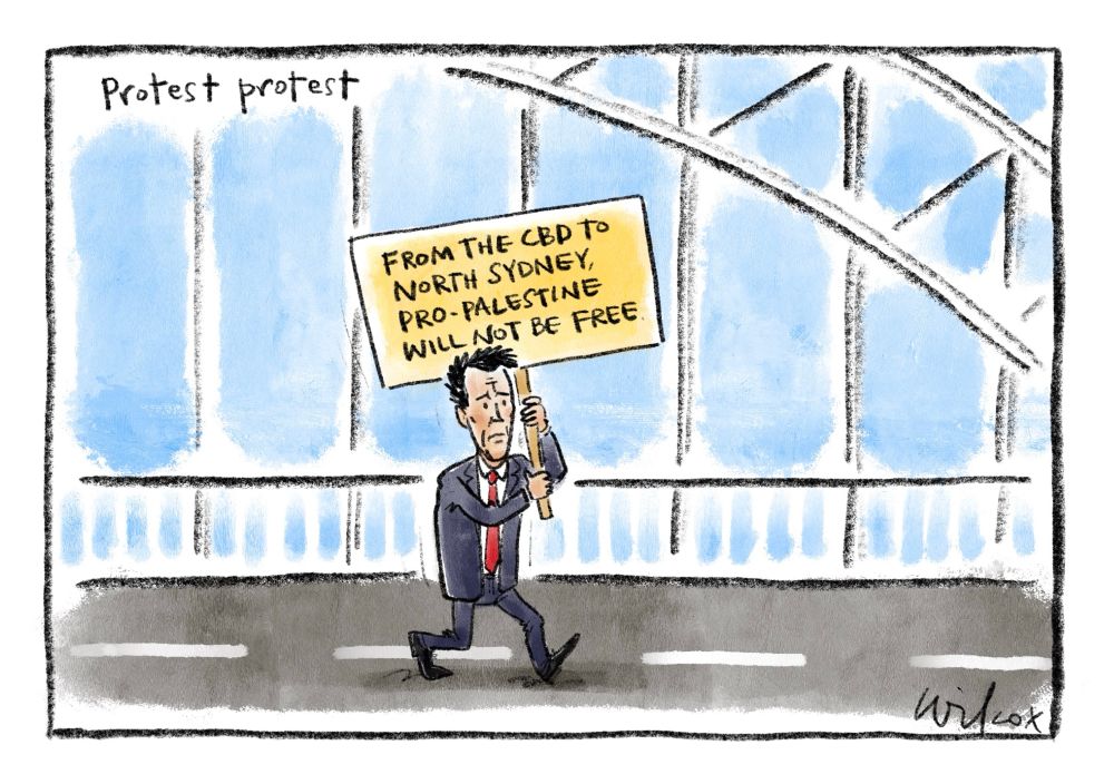 Single frame. Title: Protest protest. Chris Minns, alone, marching on the Sydney Harbour Bridge, holding a large sign saying “FROM THE CBD TO NORTH SYDNEY PRO-PALESTINE WILL NOT BE FREE.”