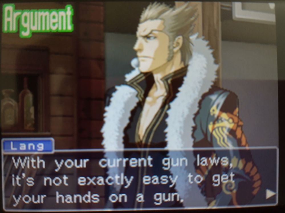 Off-screen photo of Ace Attorney Investigations 1 running on a 3DS.
Lang: "With your current gun laws, it's not exactly easy to get your hands on a gun."