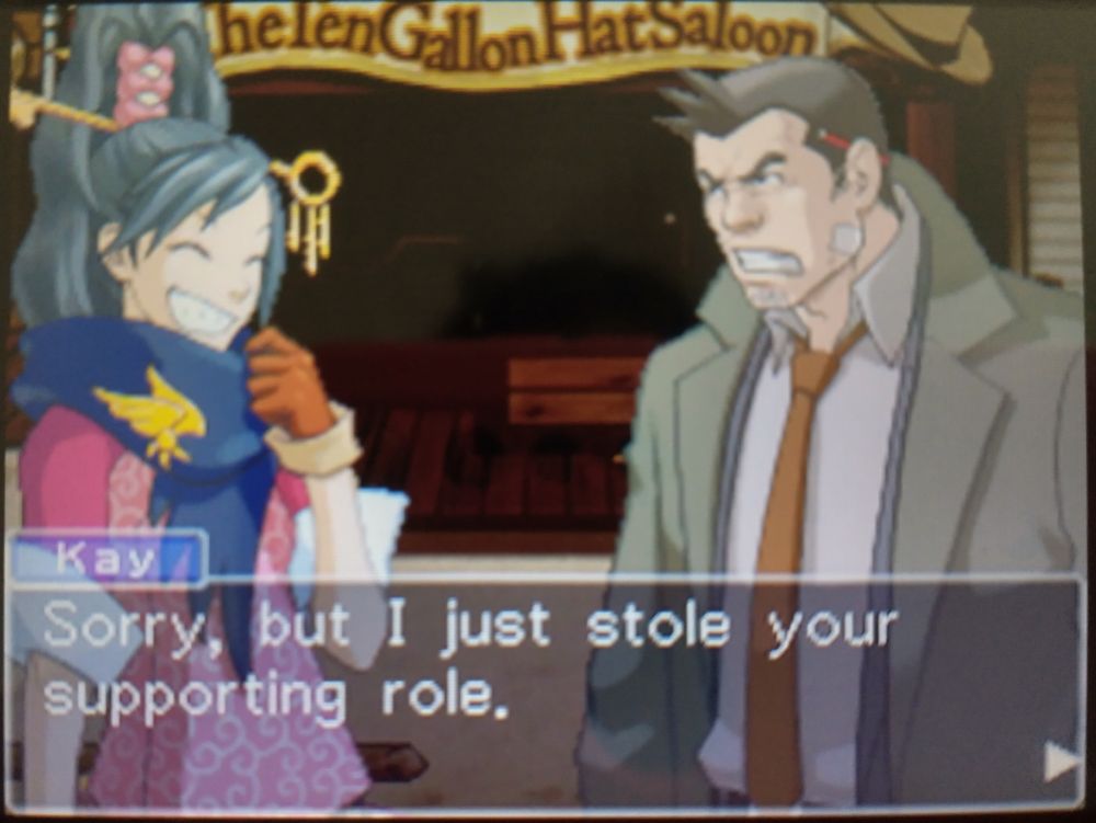 Offscreen photo of Ace Attorney Investigations 1 running on a 3DS.
"Sorry, but I just stole your supporting role." Kay says with a cheeky grin at an angry Gumshoe.