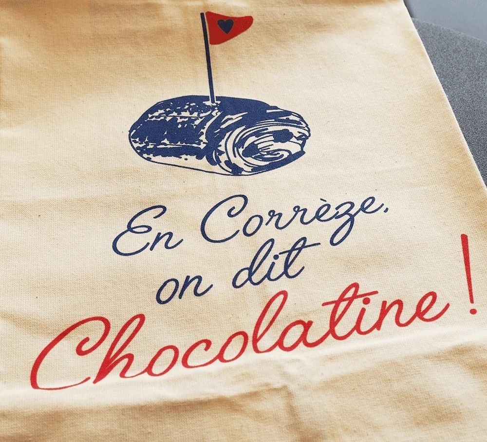 Torchon imprimé "En Corrèze, on dit Chocolatine".