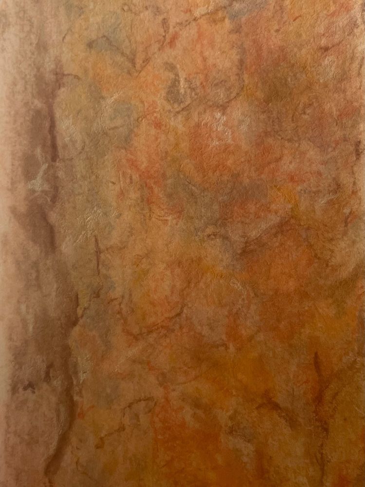 A pastel drawing of a portion of pine tree bark in sunlight. The colours are layers of oranges, greys and browns, with some of the bark ridges defined in darker browns and russets. 