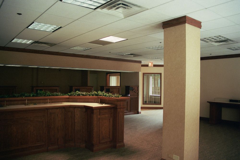 a former bank lobby, empty and devoid of people
