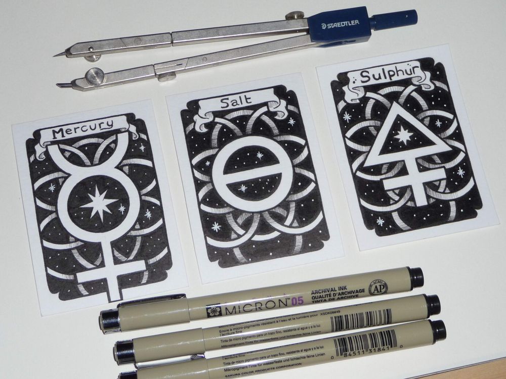 Three trading card-sized drawings of the Alchemical symbols for Mercury, Salt and Sulphur