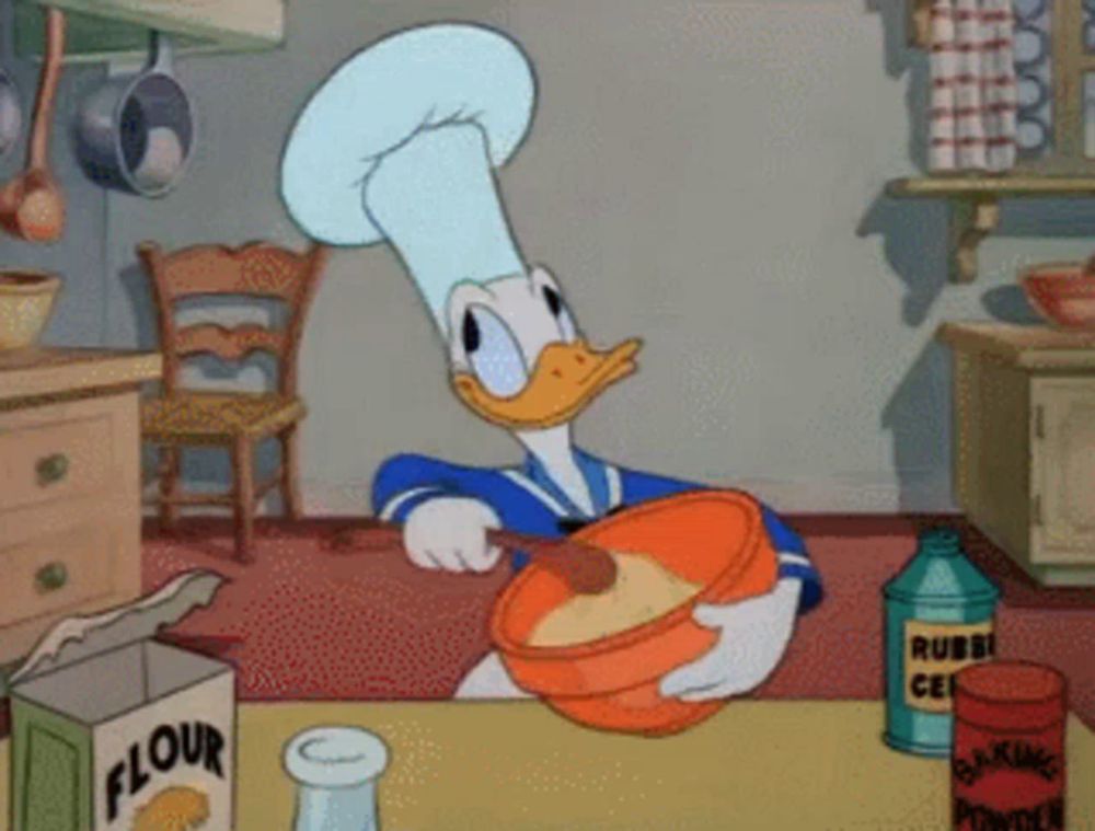 a cartoon of donald duck mixing something in a bowl with a box of flour in the background