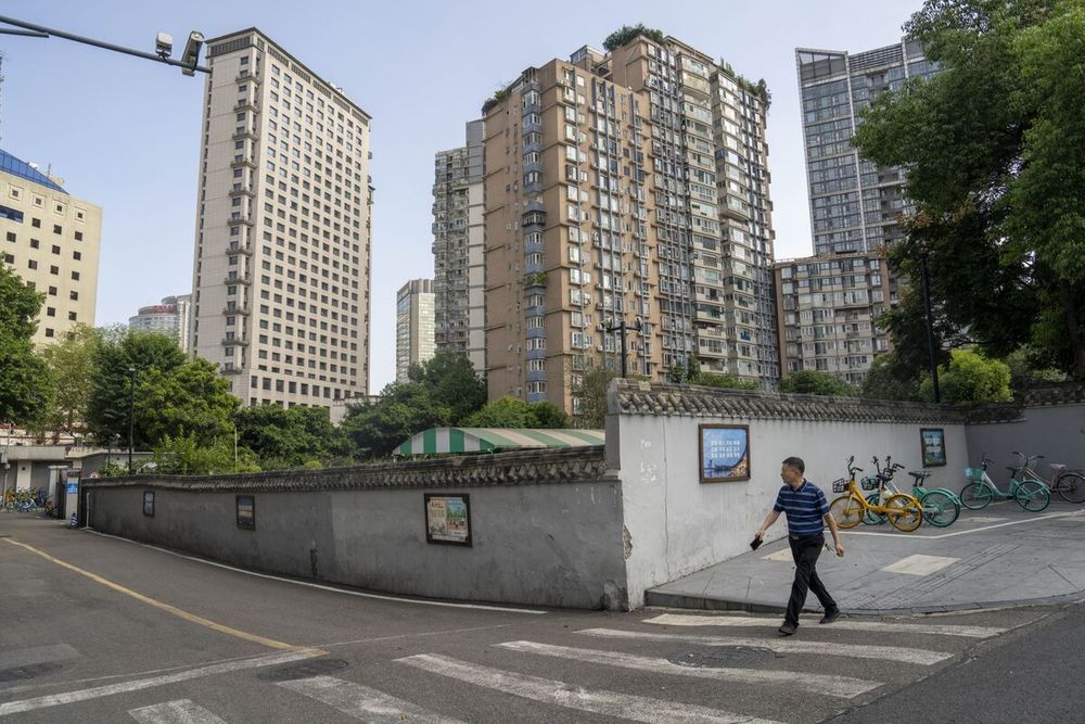 China Weighs Removing Major Homebuying Curbs to Boost Demand