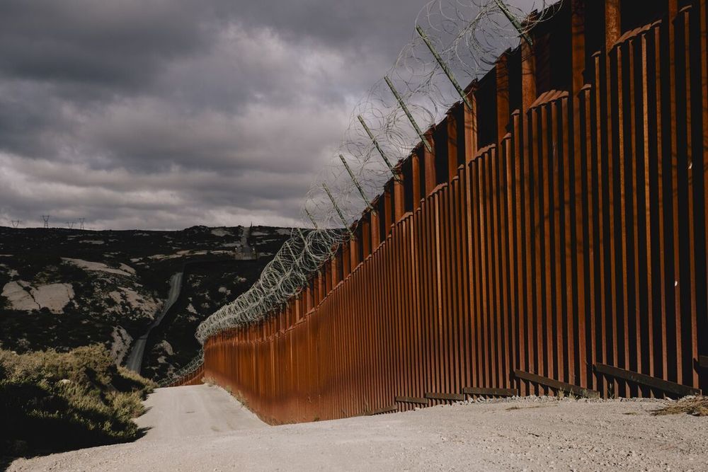 President Donald Trump has ordered the entire southern border wall to be painted black to stop migrants from crossing because it’ll be too hot to touch, according to Homeland Security Secretary Kristi Noem.