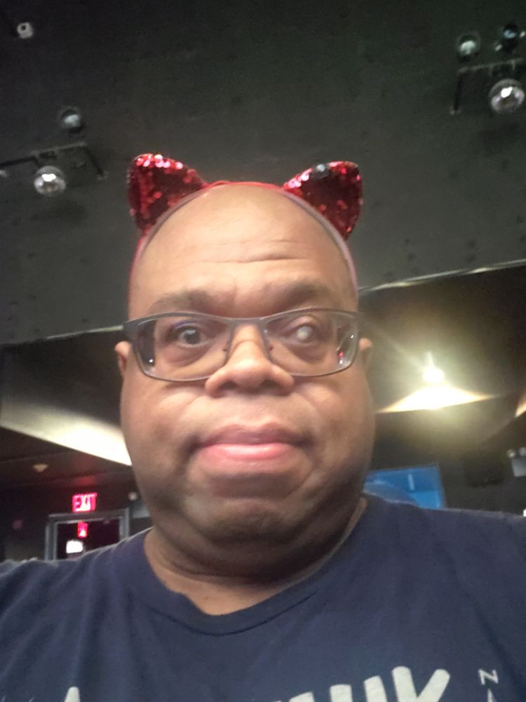 Me wearing some sparkly red cat ears at the IFC. I am ALWAYS catty.  HISS!