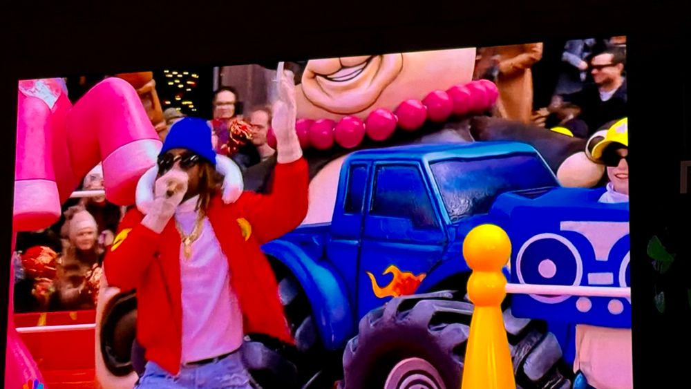 Lil Jon singing on a float.