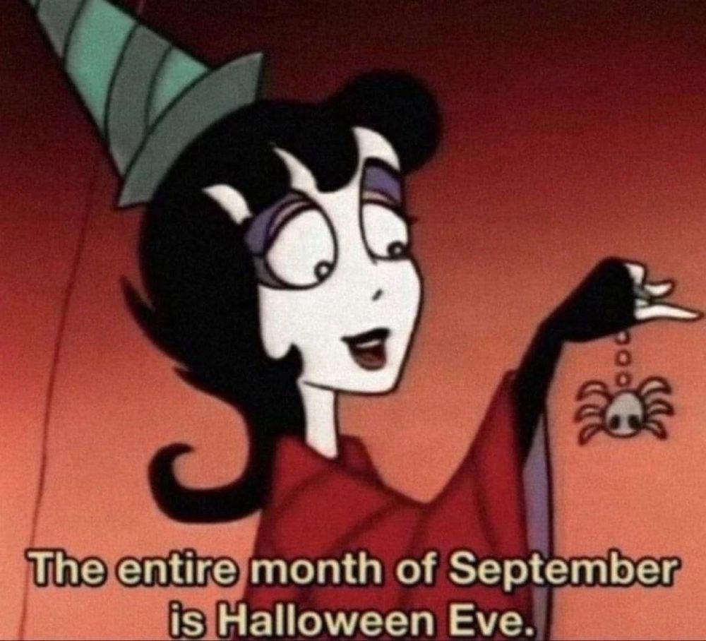 Lydia Deets, a goth girl from “Beetlejuice” the cartoon show, holding a spider decoration. 