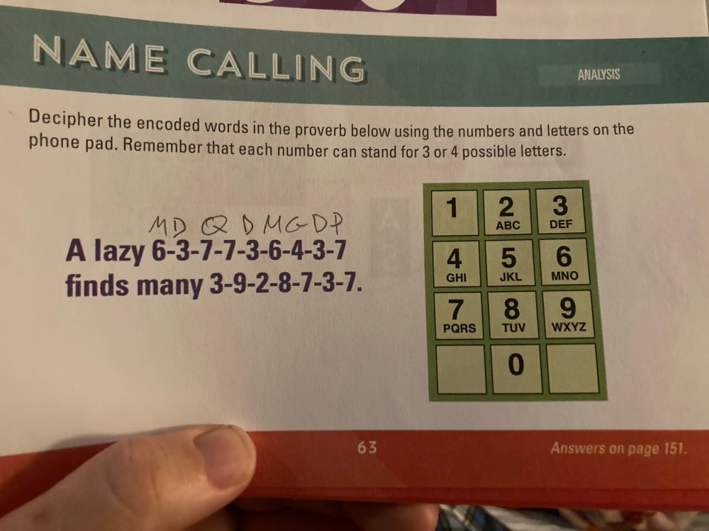 Okay I am VERY stoned, but it’s a photo of a number code puzzle. It says “A lazy 6-3-7-7-3-6-4-3-7 finds many 3-9-2-8-7-3-7” next to a standard phone T9 dial pad. Cairo has decoded the first word as “MDQDMGDP”