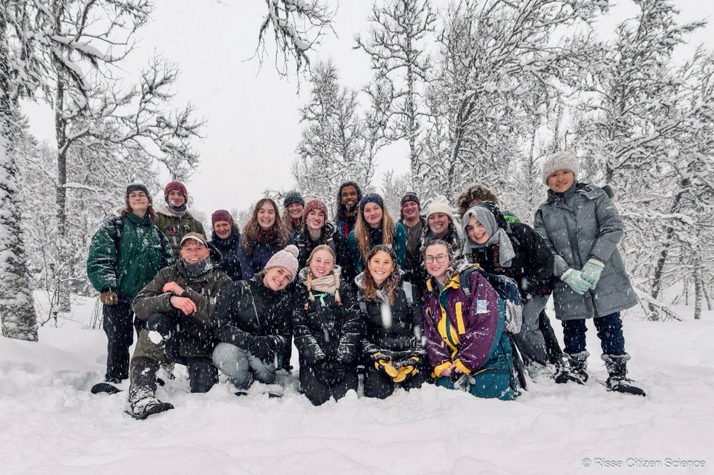 Group photo in the forest after an exciting day of searching for animal tracks in the snow