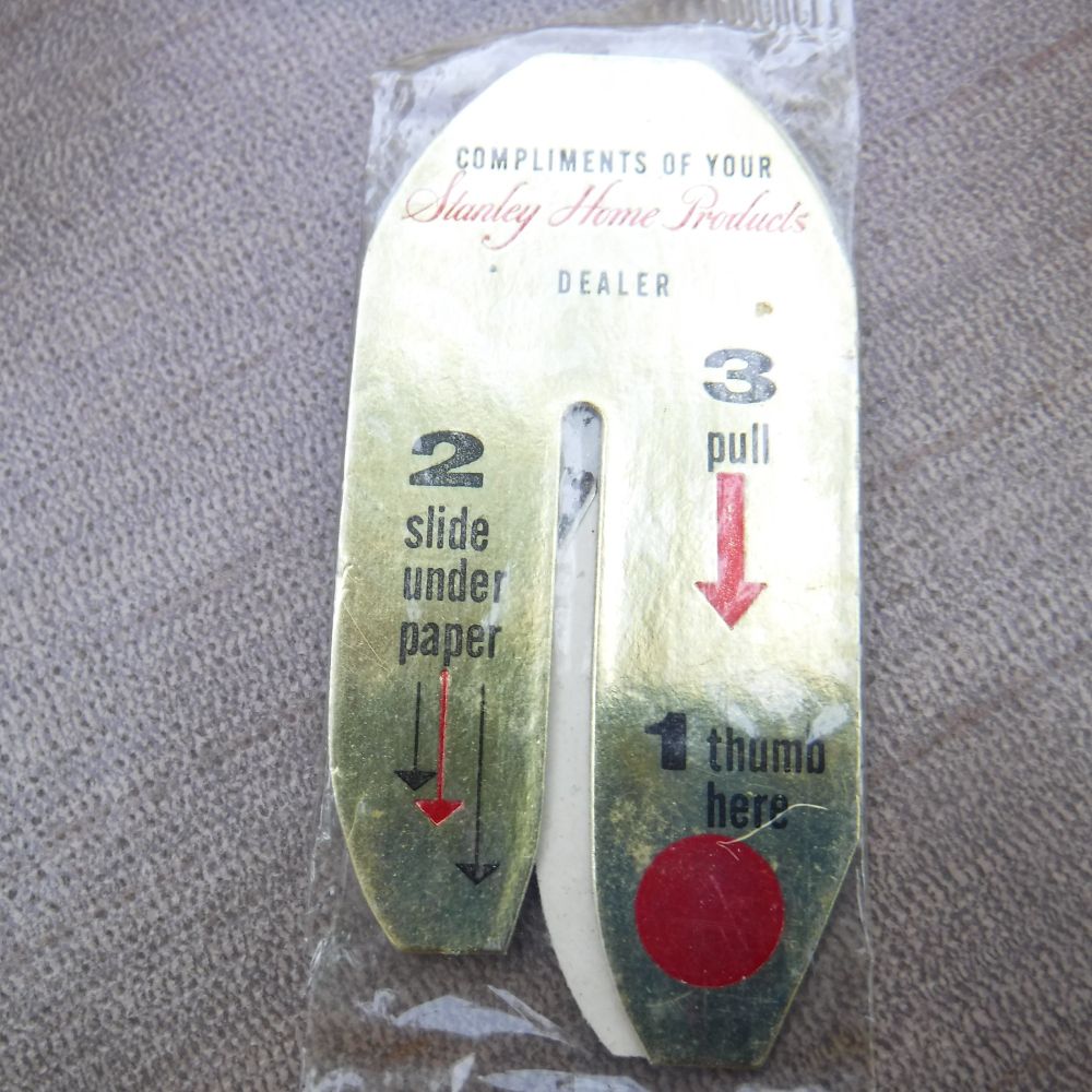 Compliments of your Stanley Home Products DEALER
1 thumb here
2 slide under paper
3 pull