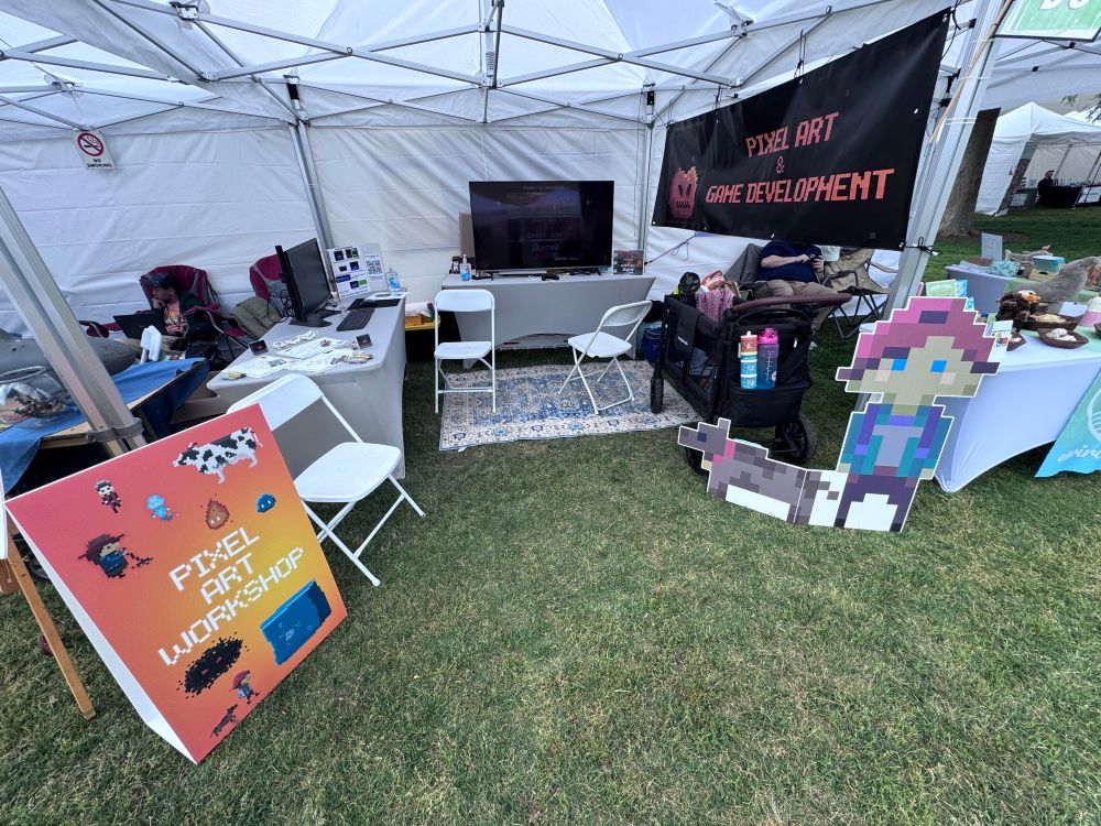 A convention booth for pixel art and game dev