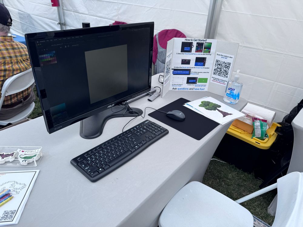 A computer monitor with pixel art software