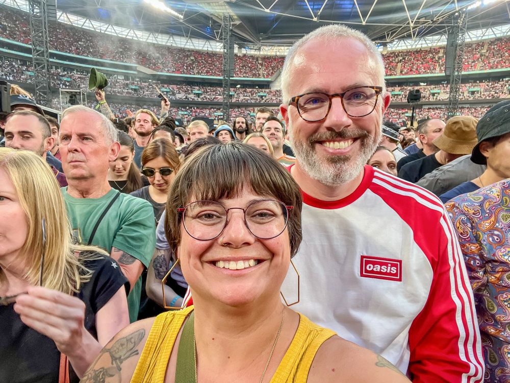 Photographs from an concert by British rock band Oasis at Wembley Stadium in London.