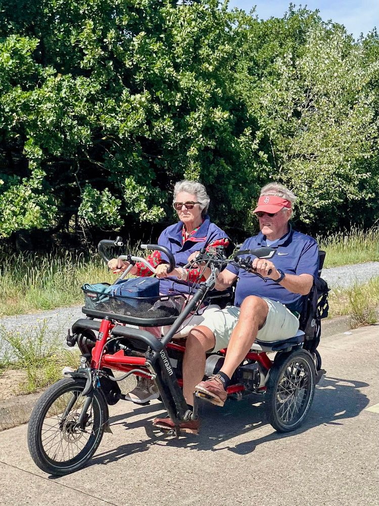 People of all ages and abilities ride tricycles for transportation on the streets of the Netherlands.