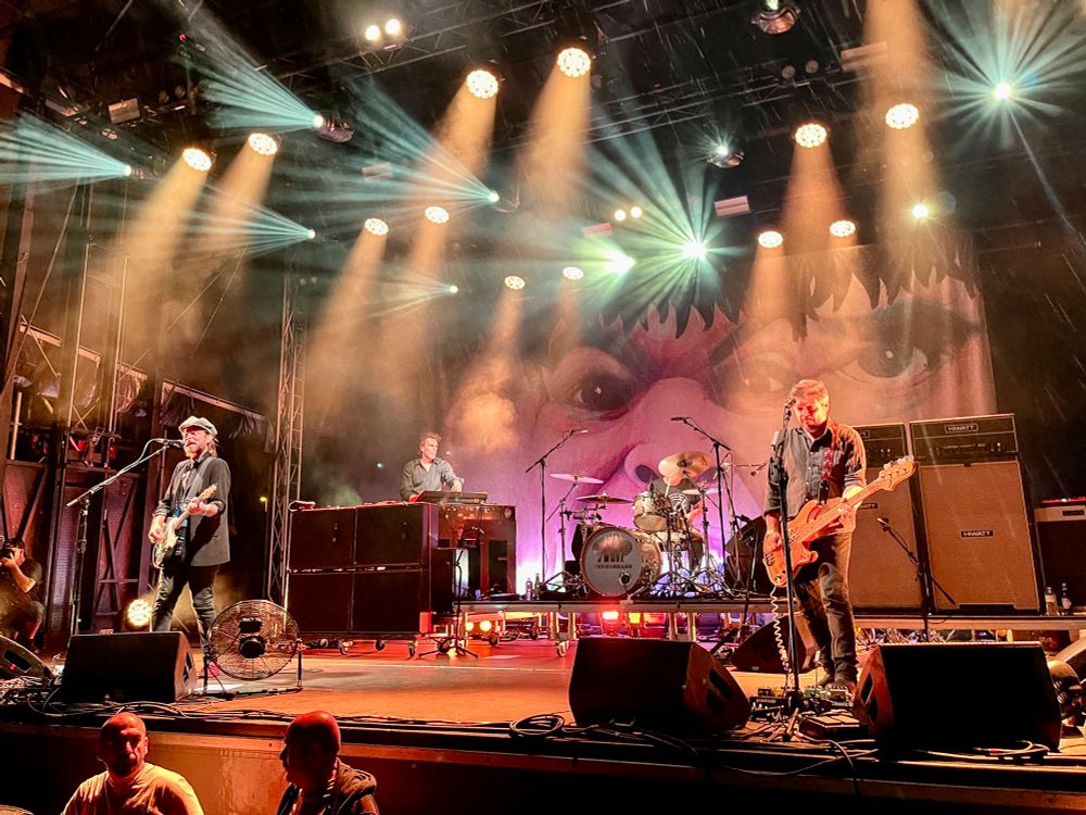 Photographs from an outdoor concert by British rock quartet Supergrass at the Rock Olmen Festival in Olmen, Belgium.