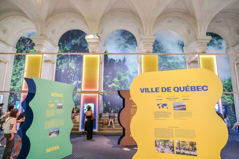 Photographs of “From Paris to Belém”, an interactive visual exhibition celebrating a decade of urban transformation in the fight against climate change, which is being curated by the City of Paris in the Hôtel de Ville.