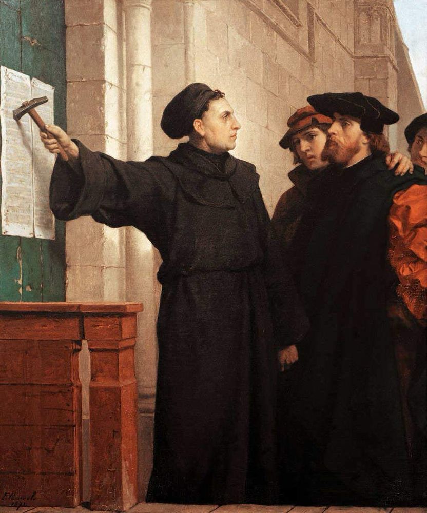 Martin Luther nails his 95 Theses to the door of All Saints' Church.