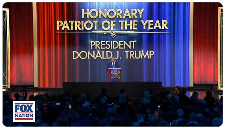 Trump accepts fake award.