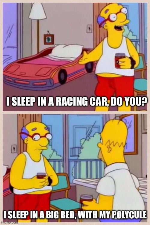 Two panel meme. Kurt van Houten is bragging to Homer Simpson, “I sleep in a racing car, do you?” Homer says “I sleep in a big bed with my polycule.”