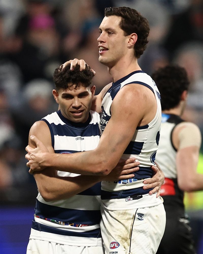 Shannon Neale and Tyson Stengle who is a head shorter celebrate a goal.