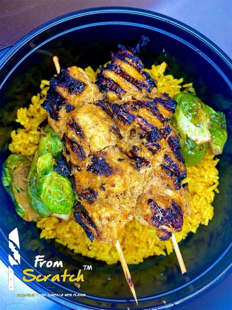 Chicken tikka skewers over yellow rice and roasted Brussels!! 