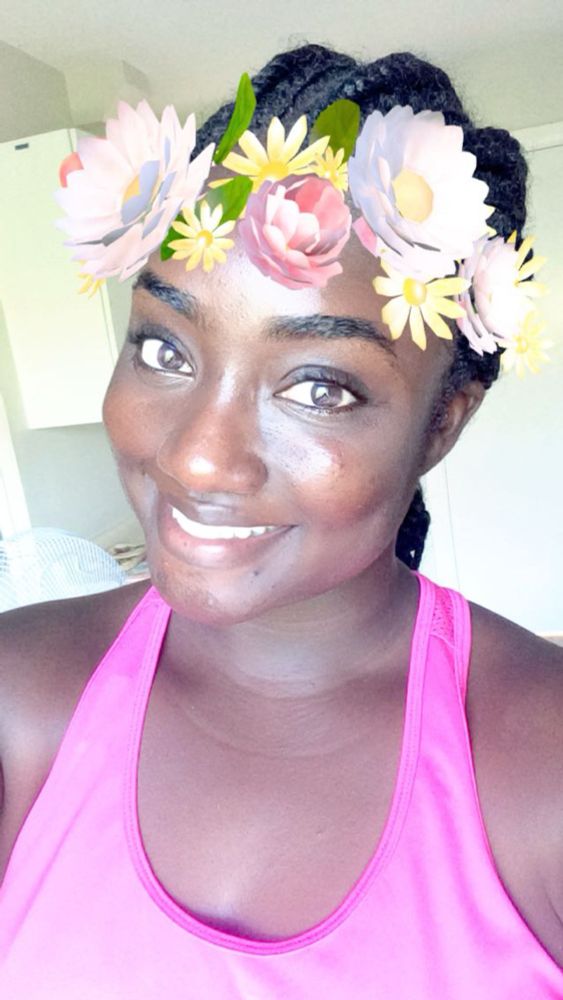 Women in with a Snapchat flower filter on her head