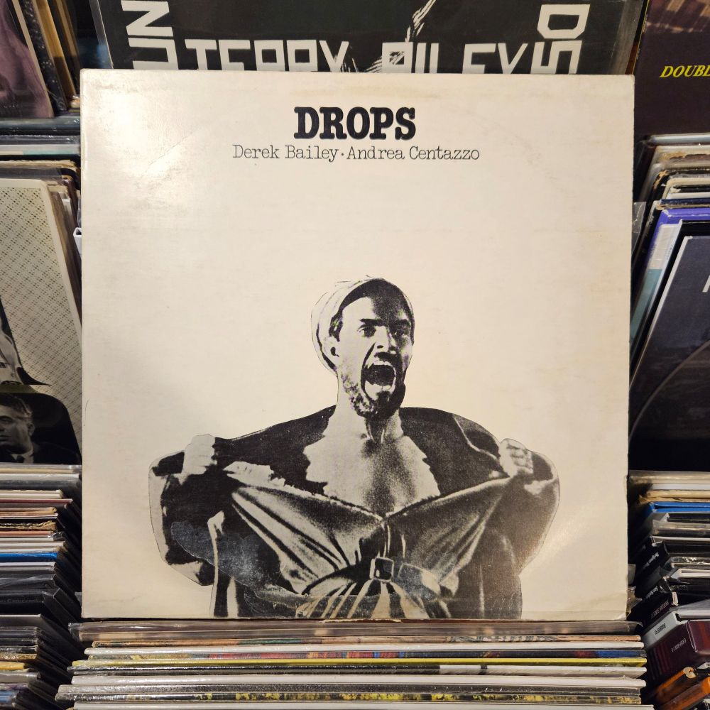 Album cover shows a photograph of a man (Centazzo?) pulling his jacket off his body and, by the look of it, yelling.