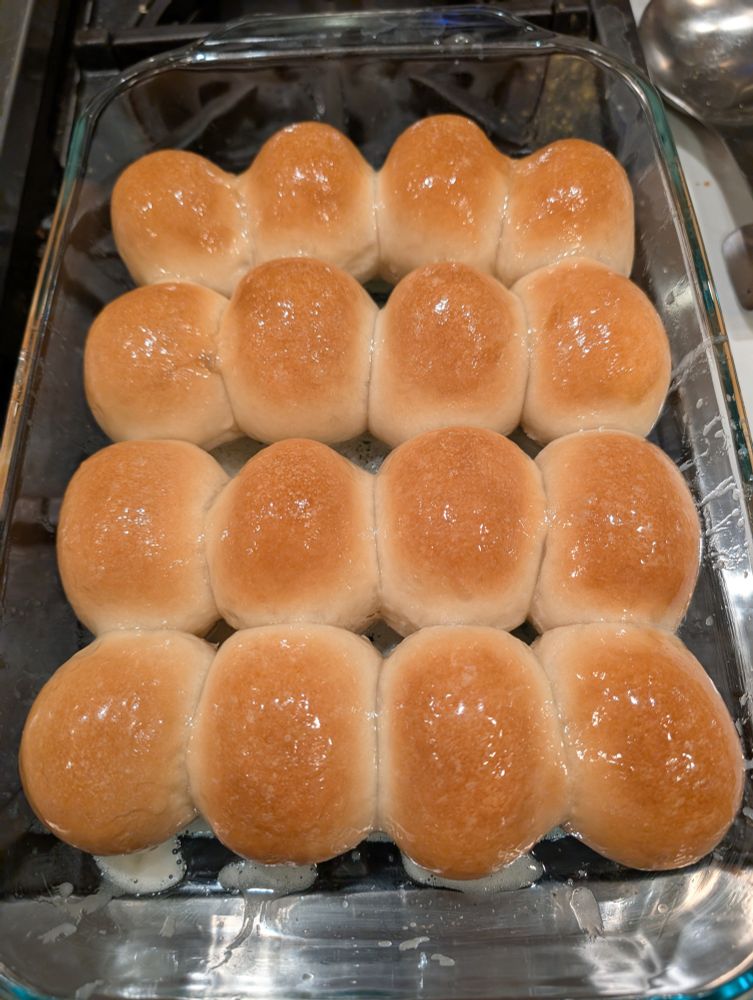 A dish of 16 honey butter rolls fresh from the oven.
