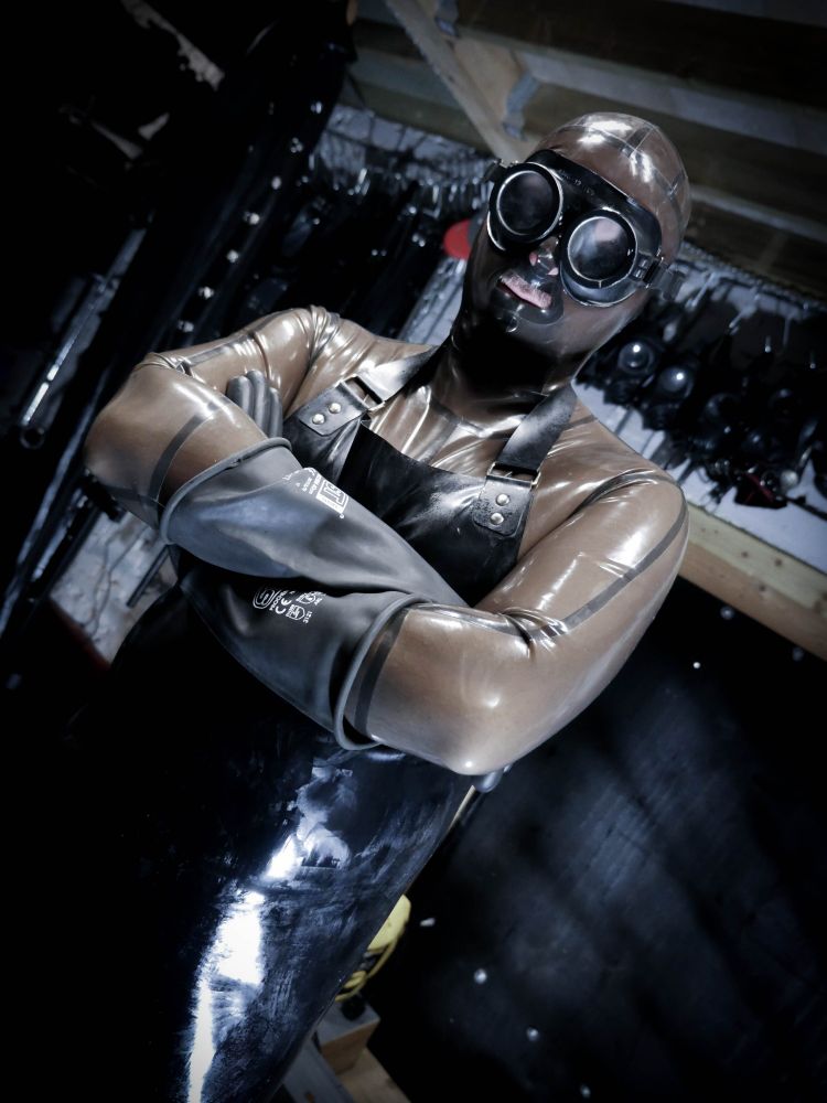 Me dressed in rubber outfit and apron
