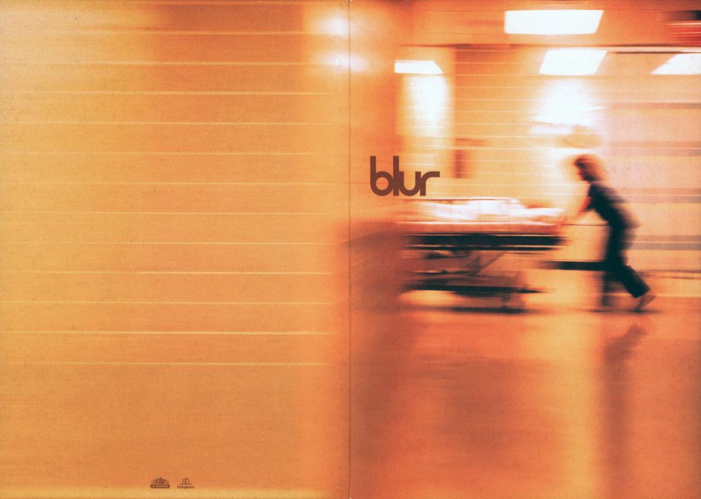 Opened-out brochure for Blur's self-titled album, showing the cover art which has been extended / expanded to fill the full A3 space. There are two small logos for Food Records and Parlophone on the back.