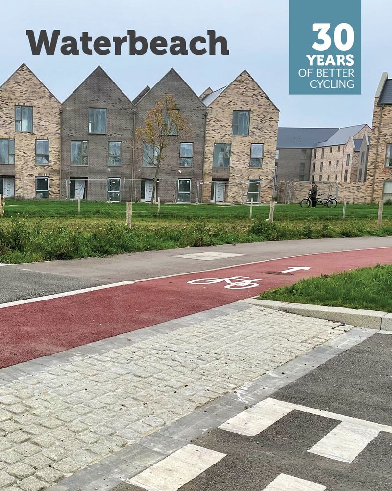 A red cycle lane and Dutch entrance kerb are set in front of a row of new houses with pitched roofs. Overlaid is a '30 years of better cycling' logo and the text 'Waterbeach'