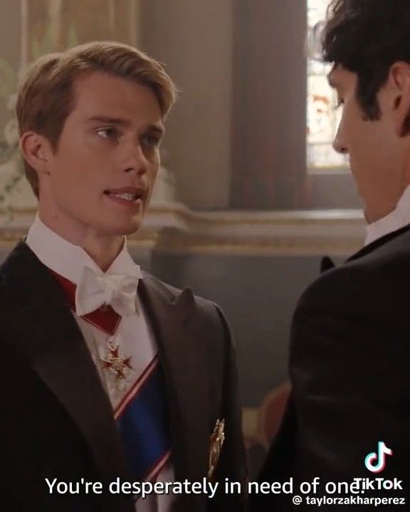 A man glaring angrily at another man while saying "You're desperately in need of one."