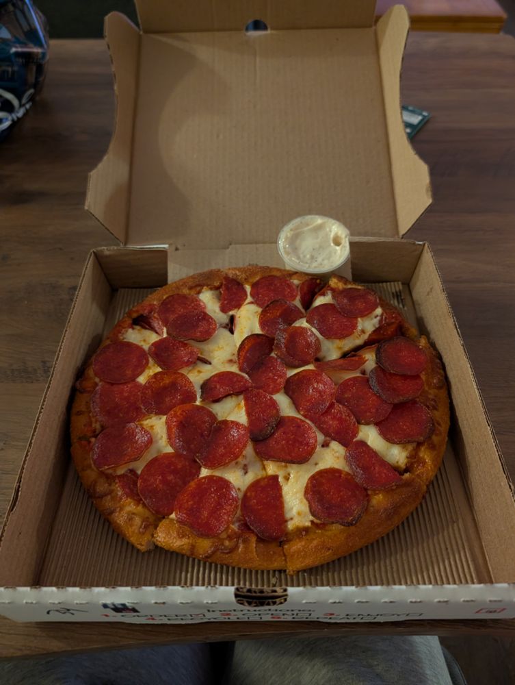 pepperoni pizza in front of me (for me)
