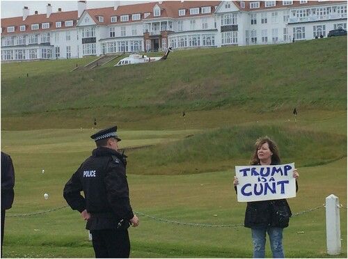 Janey Godley expressing a widely held opinion at one of President Trumps Scottish golf courses. Looked on passively by a member of the Scottish Constabulary 