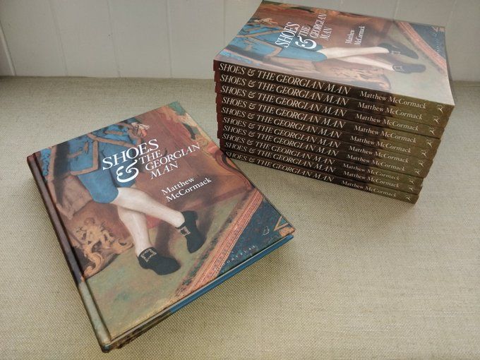 pile of books, Shoes and the Georgian Man