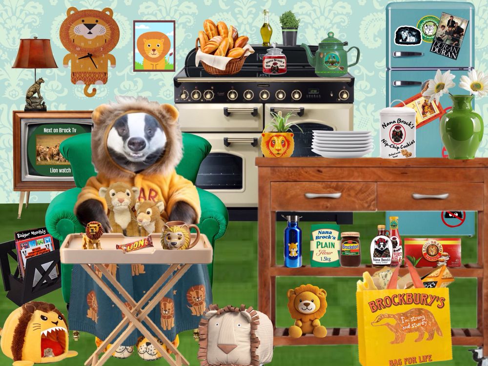 Brock is dressed in a lion onesie and is sitting at a table with a lion blanket over his lap and a lion design mug and a lion chocolate bar , there are several stuffed lions and a lion clock and a lion wildlife programme on the television.