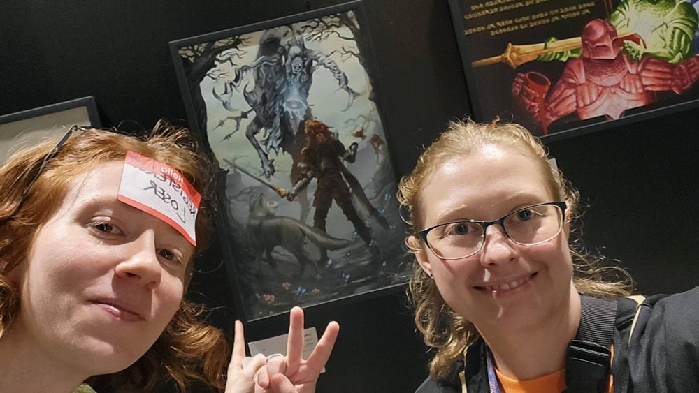 selfie with me and wife in front of the showcase picture by Pyraraptor~