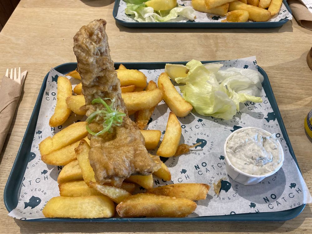 A tray of vegan fish and chips.