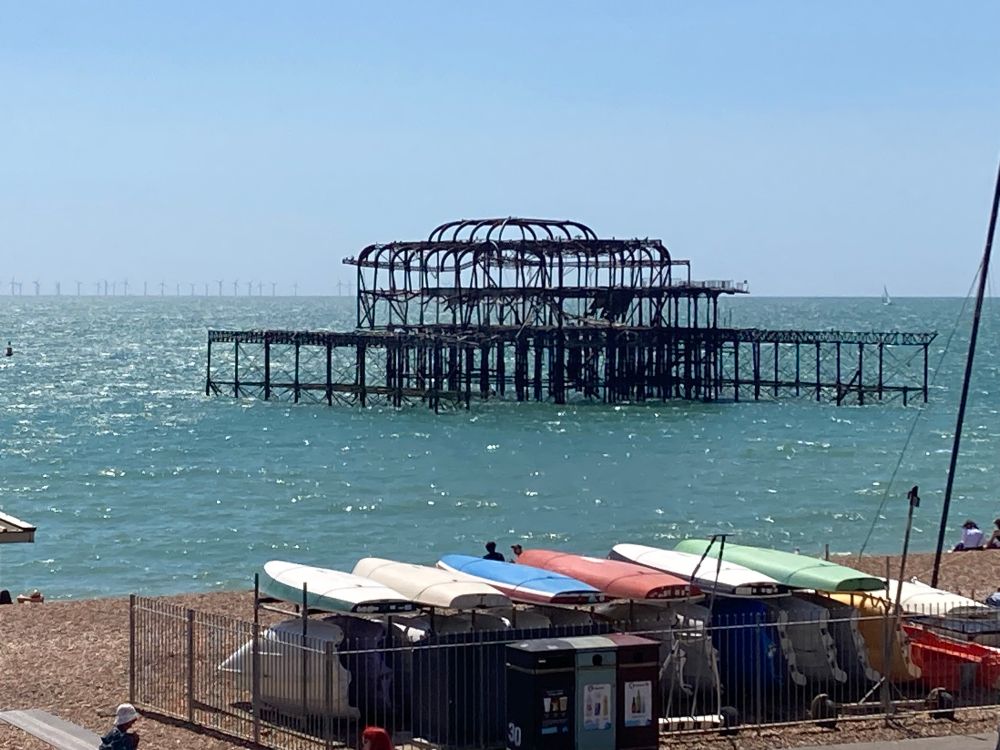 A big wire structure sits alone off the coast of Brighton beach.
