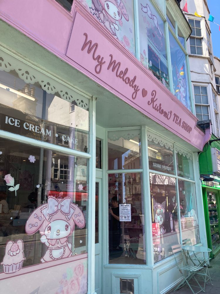The front window of a “My Melody and Kuromi tea shop”.