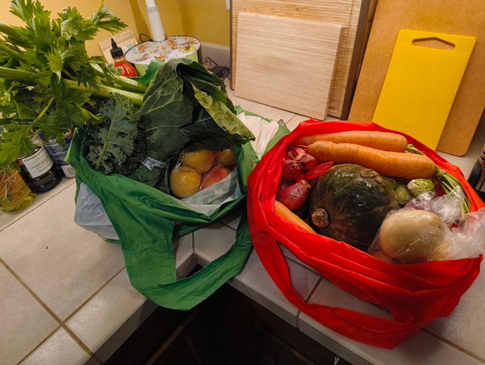 A variety of local vegetables and fruit from a Community Supported Agriculture order