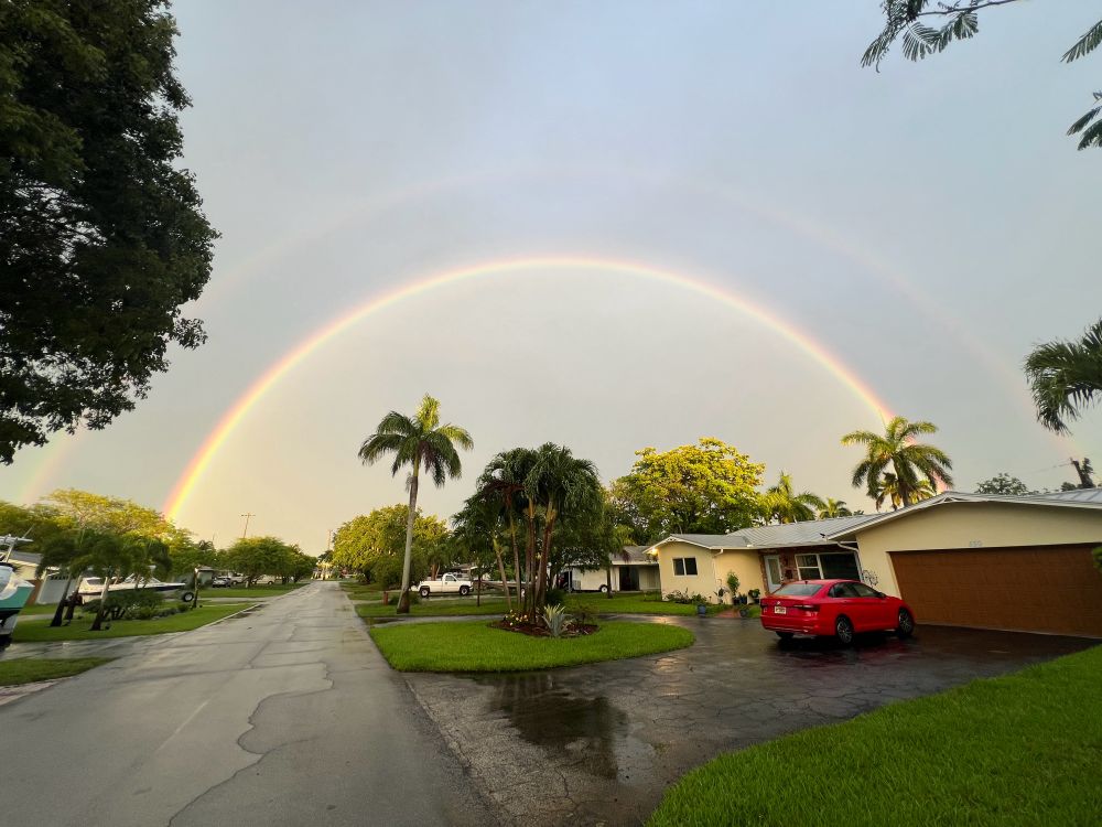 An incredibly bright, full rainbow