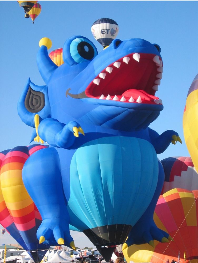 Blue hot air balloon in the shape of a blue monster. Balloon Fiesta Albuquerque 2004.